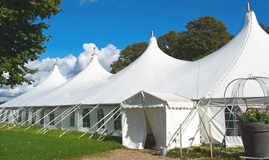 high-quality portable toilets stationed at a wedding, meeting the needs of guests throughout the outdoor reception in Middletown OH